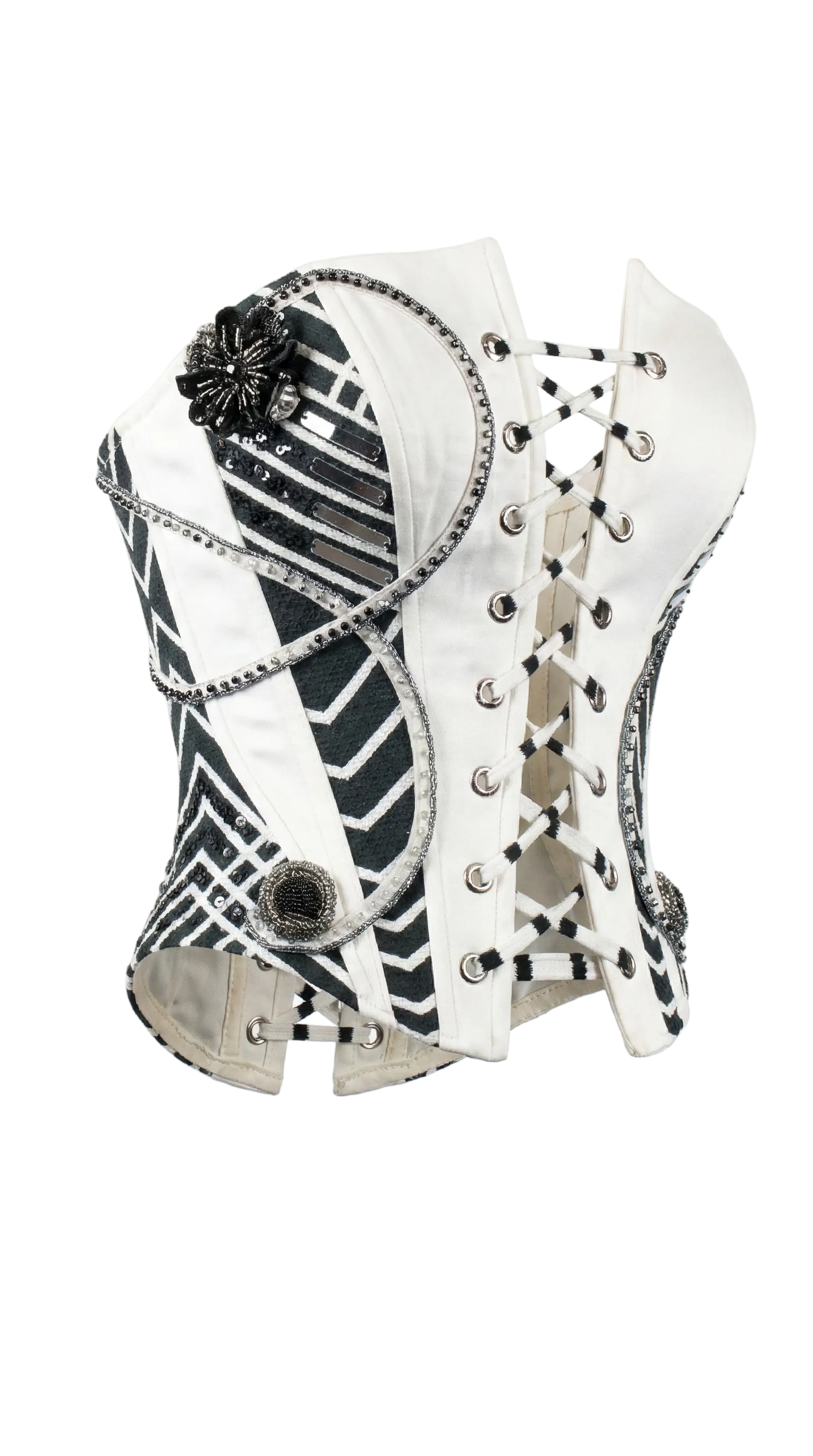 Decorative headpiece with black and white patterns on a white background