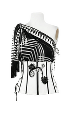 Black and white patterned scarf on a mannequin with a white background